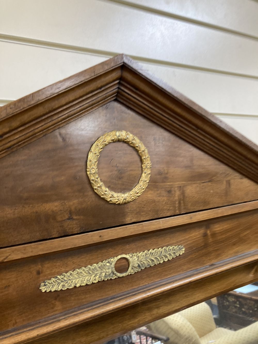 An Empire style mahogany gilt metal mounted overmantel mirror, width 125cm height 190cm